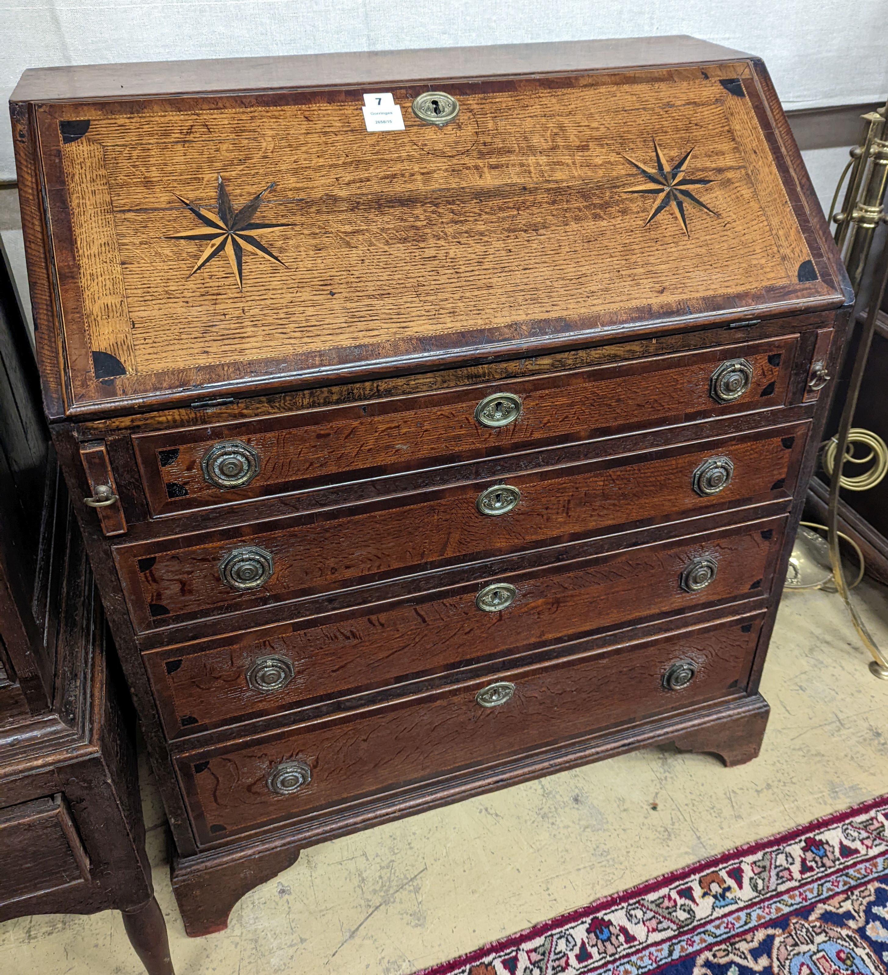 A George III inlaid oak bureau, width 85cm, depth 47cm, height 101cm